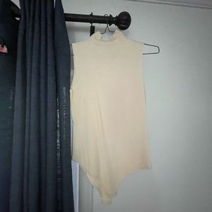 Never been worn cream turtleneck body suit